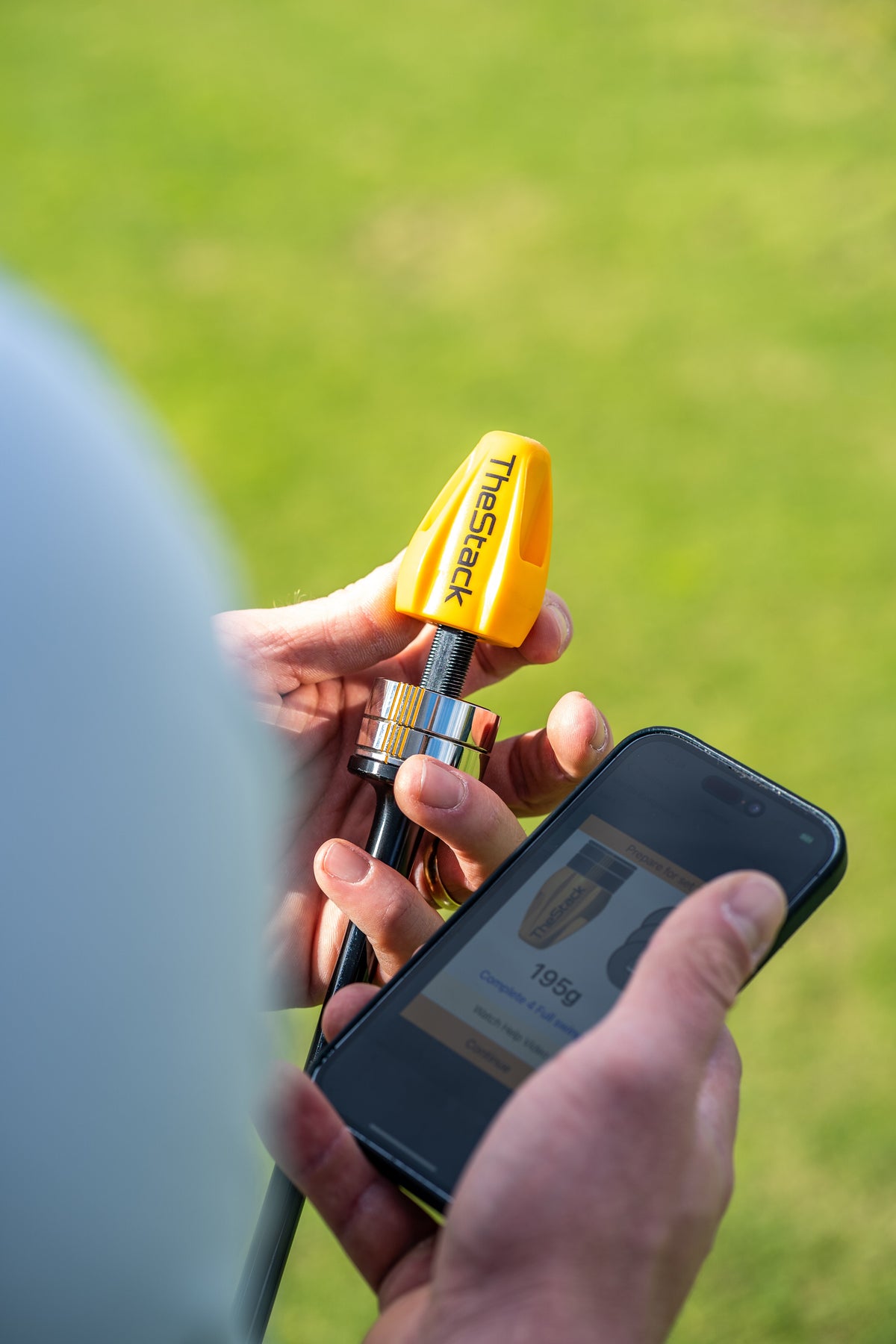 Golfer preparing to use TheStack and app